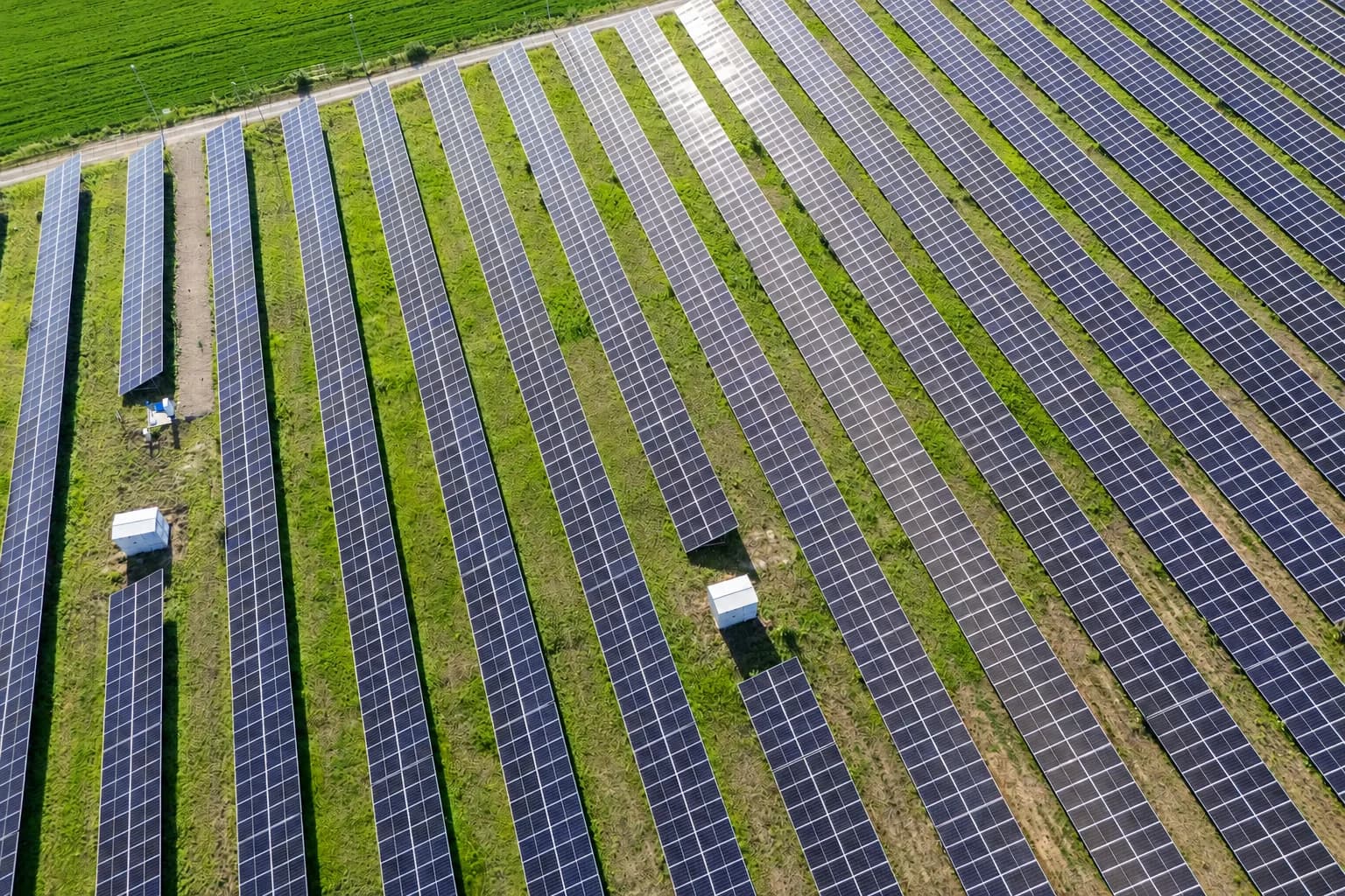 Utility-scale solar panels in a field